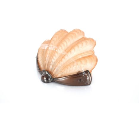 An Art Deco wall light with glass shell shaped shade 