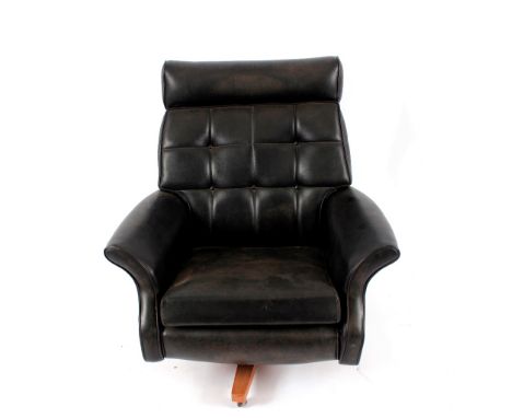 A pair of 20th Century black vinyl button back upholstered rocking and revolving armchairs 