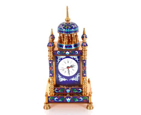 A brass and cloisonné decorated mantel clock, 33cm high in extremes 