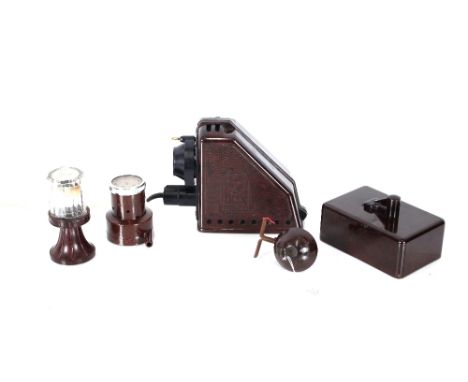 A Bakelite Dux Episcop projector; a Bakelite table lighter; a Bakelite radio device; a Bakelite cased gauge etc.