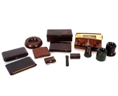 A collection of Bakelite smoking related items, including four nesting ash trays, a car fitting ash tray; three other ash tra