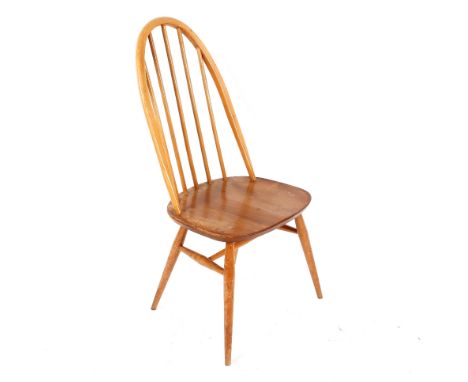 A light Ercol Grand extending dining table with folding centre leaf, 224cm x 80cm x 71cm high; and three light Ercol hoop and