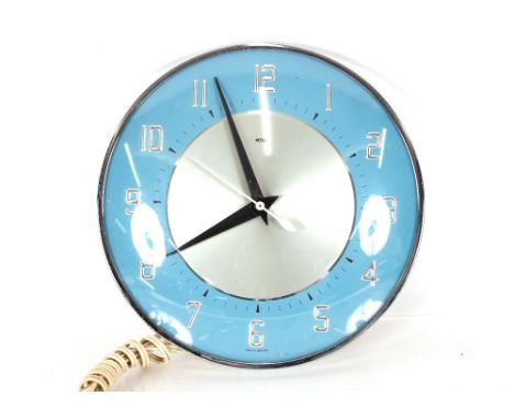 A Metamec circular electric wall clock, 20cm dia.