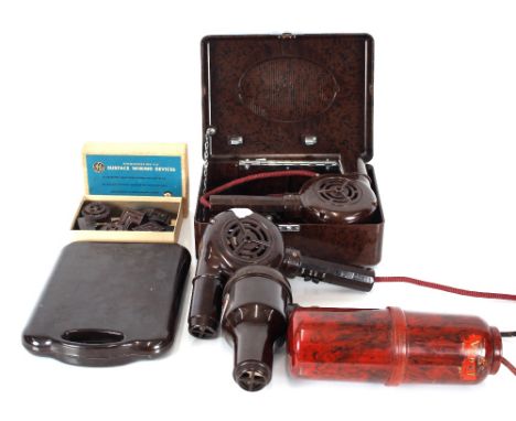 A boxed Bakelite Ormond hair dryer - sold as collector's item; two other hair dryers; four Bakelite hot water bottles and a b