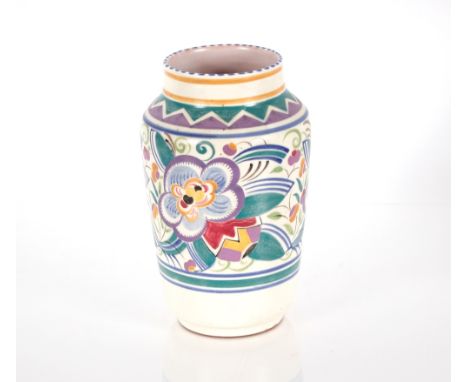 A Poole pottery vase typically decorated with brightly coloured flowers on off-white ground, 22cm high 