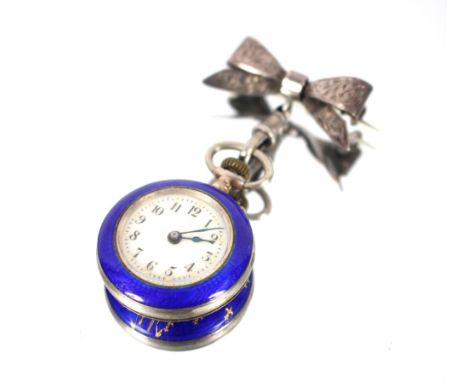 A silver and blue enamel fob watch, marked Dido to the reverse interior, suspended from silver bow pin, approx. 3cm dia. to t