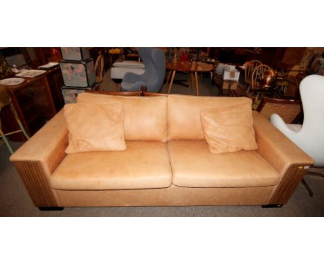 A Danish loom type and leather upholstered sofa, 219cm x 93cm 