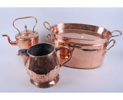 An oval copper fish kettle, a copper teapot, a brass trivet and a copper jugCondition:Few dings to every item