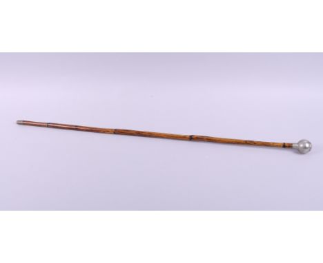 A swagger stick with Norfolk Regiment pommel