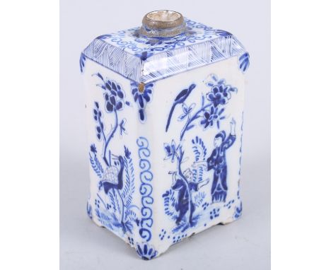 An 18th century Delft tea caddy with "Long Liza" decoration, 4 1/2" high (slight damages), a 19th century French porcelain ca