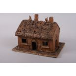A studio pottery model cottage night light, 9 1/4" wide