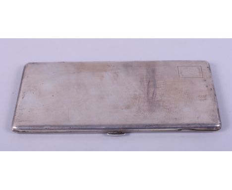 A silver cigarette case with engine turned decoration and engraved initials, 8.8oz troy approx