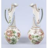 A pair of Doulton Lambeth ewers, with chrysanthemum decoration, 12 1/2" high