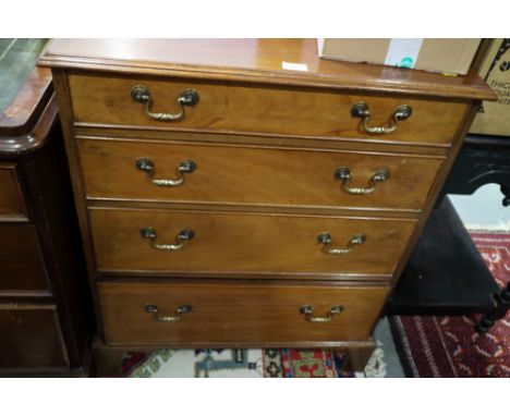 A mahogany chest of four long graduated drawers, on bracket supports, 28" wide