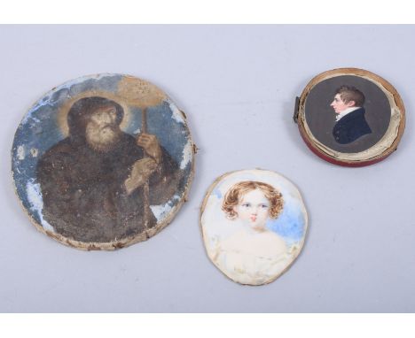 A 19th century portrait on ivory of a young gentleman, another of a young girl, and an early 19th century watercolour on pape