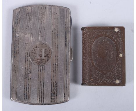 A silver cheroot case with engine turned decoration and a Bakelite vesta case, decorated with the bust of Queen Victoria