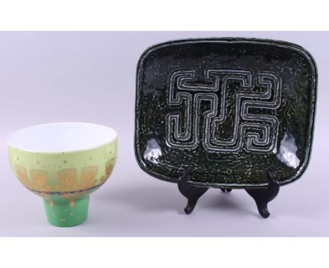 A mid 20th century Swedish green glazed pottery "Farina" pattern bowl, designed by Rostrund Gunnar Nylund, 10" dia, and a Rho