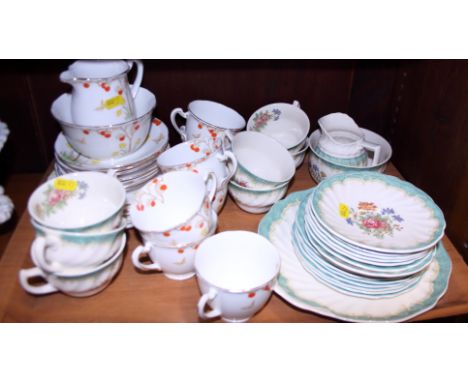 A Doulton "Kingswood" pattern part teaset, a Lawleys bone china "Orange Tree" pattern teaset for six, a Spode "Camilla" patte