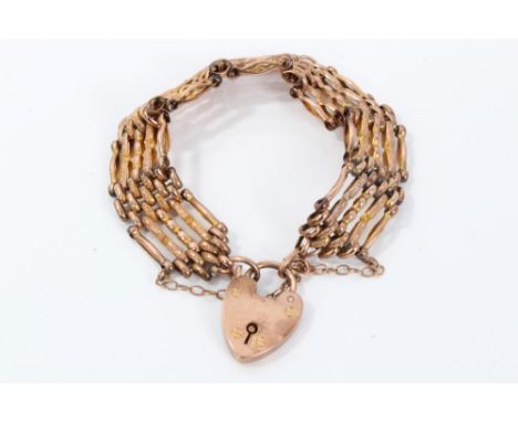 Edwardian rose gold gate bracelet with padlock clasp, stamped 9ct CONDITION REPORT gross weight approximately 21.3 grams, goo