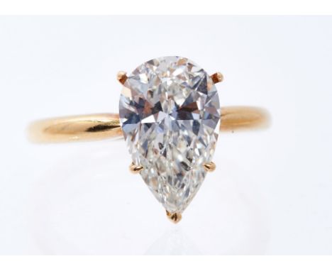 Diamond single stone ring, the pear cut diamond weighing approximately 3.50ct in four claw setting on 18ct yellow gold shank,