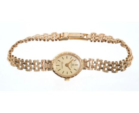 Ladies' Boodles gold quartz wristwatch with oval dial on 9ct gold gate-link bracelet. Length 17.5cm CONDITION REPORT The watc