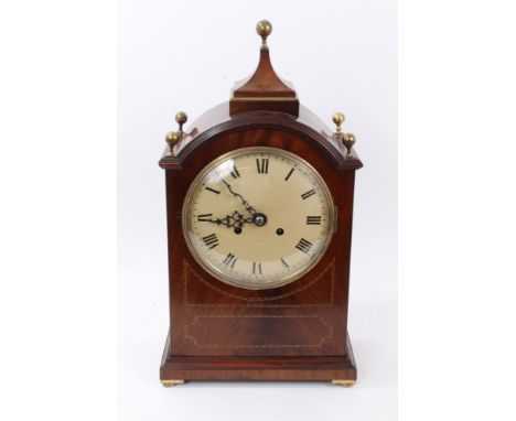 Regency-style mahogany and barber-pole strung bracket clock, arched case with brass ball finials and enamel dial with twin ch