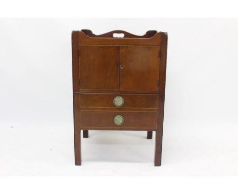 George III mahogany tray top commode, undulating gallery with integral pierced carrying handles, enclosed by pair of cupboard