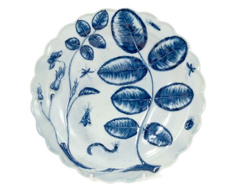 18th century Worcester blue and white 'Blind Earl' plate with raised flower and leaf decoration and painted insects within mo