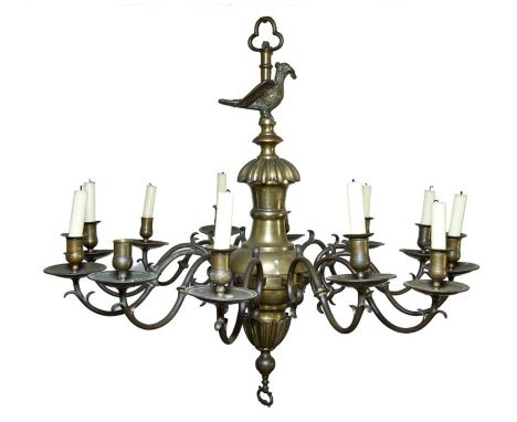 The Terling Chapel chandelier:  Fine and rare George II brass twelve-branch ecclesiastical chandelier, the central baluster c