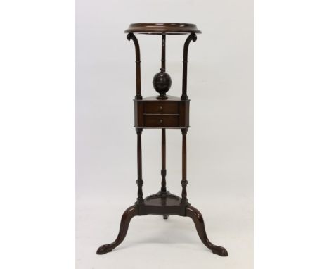 Georgian mahogany toilet stand, triangular outline with two drawer central tier and shelf below on tripod cabriole legs, 95cm