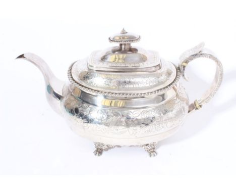 Regency period silver teapot of compressed baluster form, with bands of fruit and floral engraved decoration, gadrooned borde