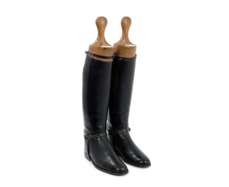 A fine quality pair of handmade black leather hunting boots by Maxwell of London, with original wooden trees with ivorine pla