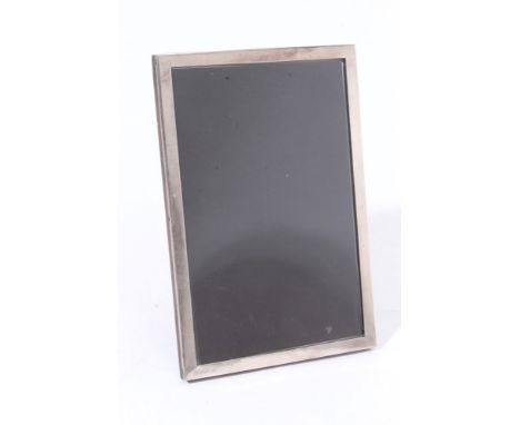 George V silver photograph frame of plain vertical rectangular form with oak easel back (Birmingham 1913) Samson Mordan, 19cm