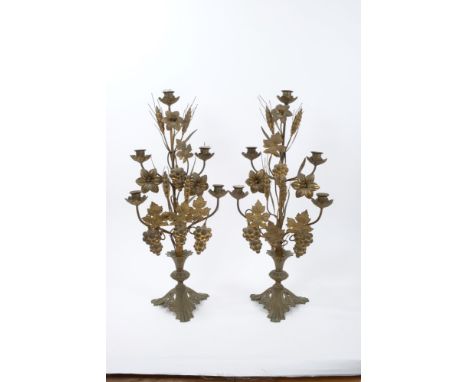 Ornate pair of late 19th century Continental candelabra with five stepped candle arms sprays of wheat, vines and flowers issu