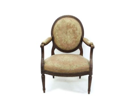 Louis XVI-style carved beech and tapestry upholstered open armchair with oval pad upholstered back, arms and seat in ribbon a