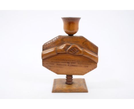 Pitcairn Islands carved wooden candlestick relief-carved with grasped hands and impressed legend 'hands across the sea - a so