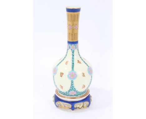 Late 19th century Royal Worcester vase in the Aesthetic style, of high necked bulbous form on integral pierced stand decorate