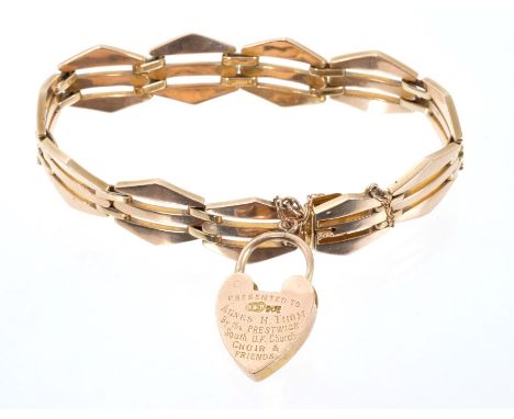 Early 20th Century rose gold gate bracelet with padlock clasp dated 1912 CONDITION REPORT Good condition commensurate with ag