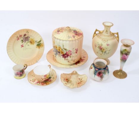 A collection of Edwardian Royal Worcester blush ivory ware, comprising two-handled vase, spill vase, biscuit barrel and cover