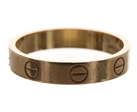 Cartier 18ct yellow gold 'Love' ring, signed, no. JFA267, size 53, width 5.5mm, 3.3gm, ring size M/N (3) 