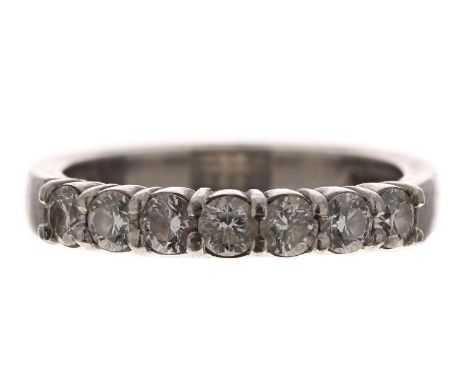 Platinum seven stone diamond ring, round brilliant-cut, 0.56ct approx in total, width 3mm, 5.9gm, ring size M/N 