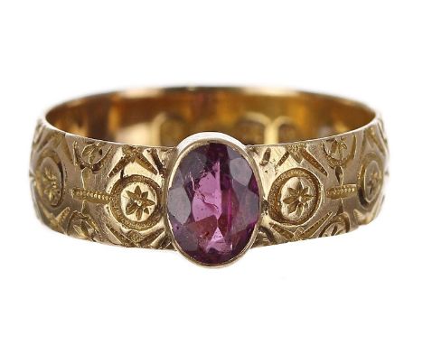Victorian 18ct engraved band ring, set with and oval garnet, Birmingham 1889, band width 8mm, 4.3gm, ring size S/T 
