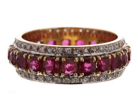 Good 18ct yellow gold ruby and diamond full eternity ring, the a centre band of rubies between diamond borders, width 8mm, 10