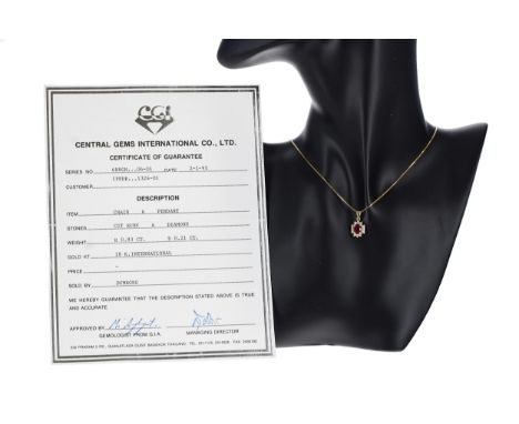 18ct yellow gold ruby and diamond oval pendant on a slender necklace,&nbsp;the ruby 0.80ct approx, in a round brilliant-cut d