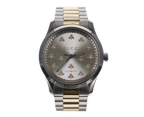 Gucci G-Timeless automatic bicolour wristwatch, reference no. 126.4, silvered dial with applied bee motif's, exhibition case 