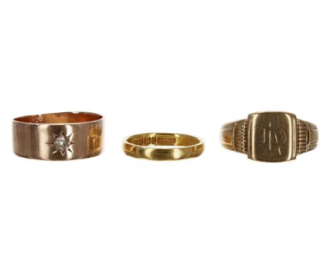 Two 9ct rings, one set with a single diamond, 9.2gm; also a 22ct wedding band ring, 3gm (3) 