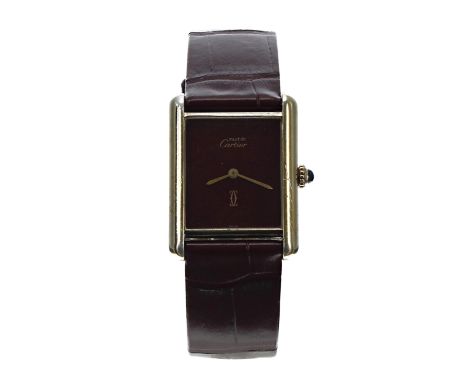 Must de Cartier Tank silver-gilt manual wind lady's wristwatch, case no. 6 112xxx, burgundy dial, cabouchon sapphire crown, m