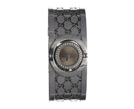Gucci Twirl stainless steel lady's bangle wristwatch, reference no. 112, quartz, band width 23mm-Box and Papers - no.Movement