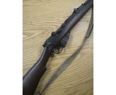 Registered Firearms Dealer Only - British Enfield .303 bolt action rifle, with adjustable rear ladder sights, detachable maga