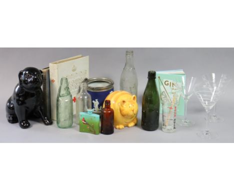 A Vintage green glass bottle “W. Burston, Weston-S-Mare”, 25cm high; a set of cocktail glasses, etc. 
